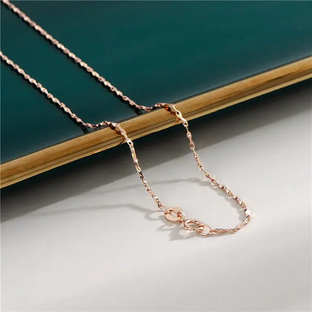 18K Rose Gold Plated Chain • Sterling Silver Base