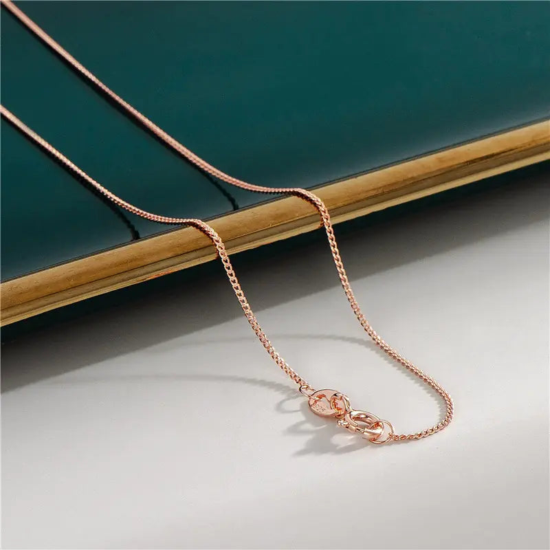 18K Rose Gold Plated Chain • Sterling Silver Base