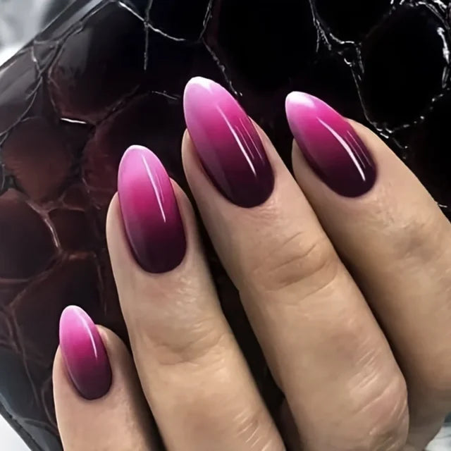 Glossy almond press-ons with pink to plum ombre gradient. Tech-friendly length, perfect for typing. Easy application, salon finish. Ships free.