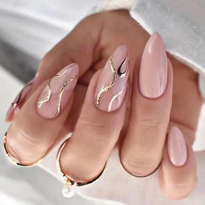 Luxe rose nude press-on nails with gold chrome wave accents. Tech-friendly almond shape perfect for typing. Easy application, premium finish. Ships free.