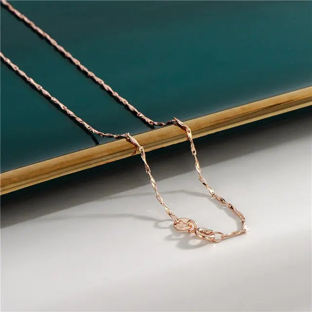 18K Rose Gold Plated Chain • Sterling Silver Base