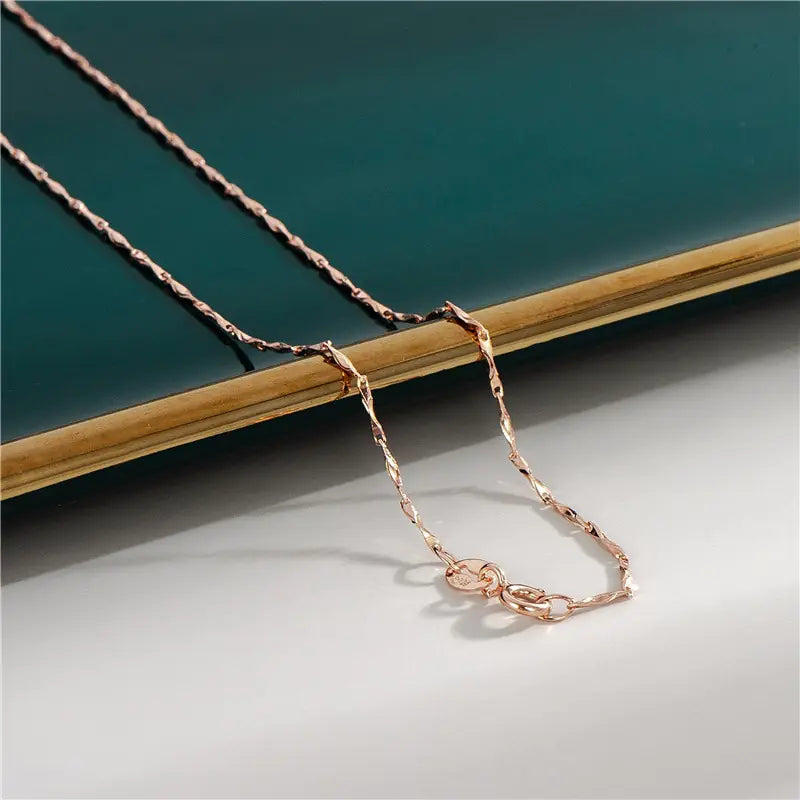 18K Rose Gold Plated Chain • Sterling Silver Base