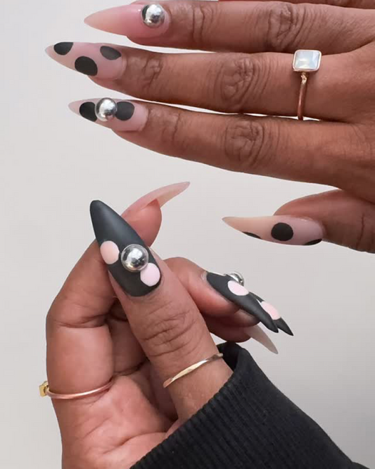 Easter egg polka dot nail design with silver stud accents, Claws x Code