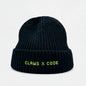 Black beanie with CLAWS X CODE 8-bit text on a knit fisherman's beanie.