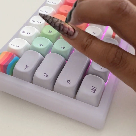 Frost: joi typing on the frost retro finder, glowing purple under rainbow keys